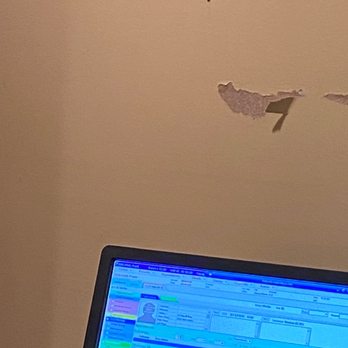 Freehold Ophthalmology - Wall behind door in exam room - Optometrists Near Me - Toms River, New Jersey