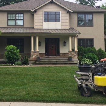 Henderson Fertilizing - a man mowing the lawn - Landscaping Near Me - Springfield, Pennsylvania Henderson Fertilizing - a man mowing the lawn - Landscaping Near Me - Springfield, Pennsylvania