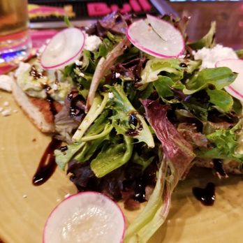 The Dime Granville - a plate with a salad and a beer - Bars Near Me - Vancouver, British Columbia