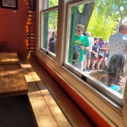 Inside and outside during a recent fundraiser for art & music in schools by the owners of Delta of Venus.