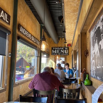Smith & Son Corner Kitchen - Enclosed seating with a great view! - Chicken Wings Near Me - Gatlinburg, Tennessee Smith & Son Corner Kitchen - Enclosed seating with a great view! - Chicken Wings Near Me - Gatlinburg, Tennessee