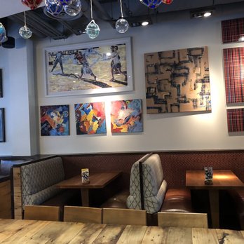 Nando's Peri-Peri - Lovely wall art. - Portuguese Near Me - Gaithersburg, Maryland