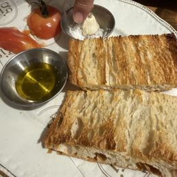 Tomato garlic bread, server told us how they do it. Tomato garlic bread, server told us how they do it.