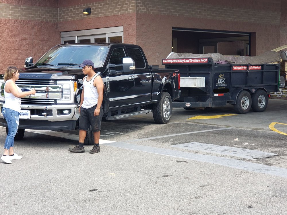 Slide of King Roofing Pros