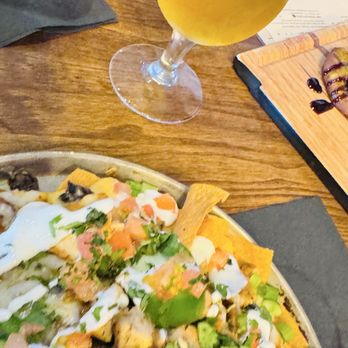 World of Beer - Loaded nachos that looked promising but fell flat seed oil heaviness you can taste - Beer Bar Near Me - Miramar, Florida World of Beer - Loaded nachos that looked promising but fell flat seed oil heaviness you can taste - Beer Bar Near Me - Miramar, Florida