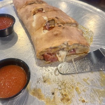 Two Cousins Pizza - Large deli Stromboli after we removed two pieces - Italian Near Me - Stevens, Pennsylvania