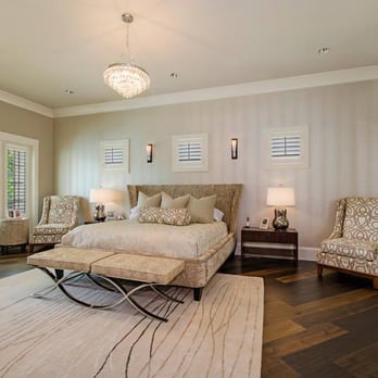 Hessler Floor Covering - a bedroom with a large bed - Carpeting Near Me - Naples, Florida Hessler Floor Covering - a bedroom with a large bed - Carpeting Near Me - Naples, Florida