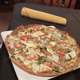 a pizza on a table a pizza on a table