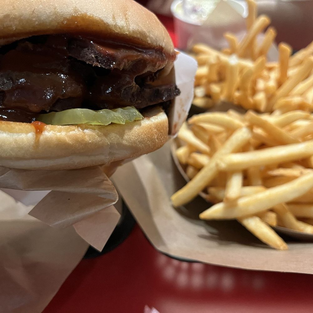Cowboy Burgers & BBQ - Tri-Tip Sandwich with a side of French fries (everything is "A La Carte" - Burgers Near Me - Riverside, California
