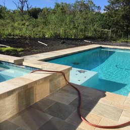 Our new Kona pool done by SCV pools. The porcelain tile was done as well by SCV pools. Our new Kona pool done by SCV pools. The porcelain tile was done as well by SCV pools.