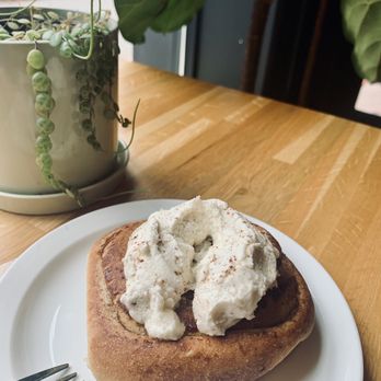 Woodhouse Vegan - Pumpkin infused cinnamon roll (warmed, so the frosting melted a bit) - Coffee & Tea Near Me - Columbus, Ohio