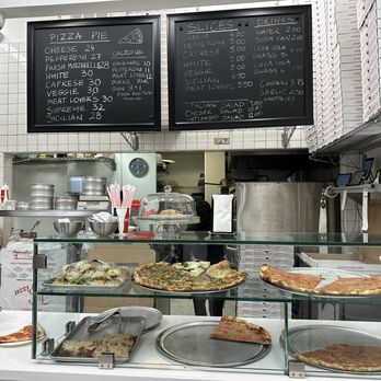 Joe’s Pizza Beverly Hills - Inside - slices case and menu - Pizza Near Me - Beverly Hills, California Joe’s Pizza Beverly Hills - Inside - slices case and menu - Pizza Near Me - Beverly Hills, California