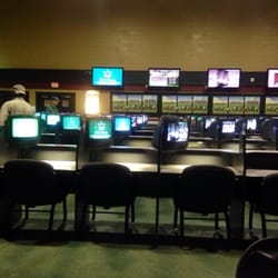 Gretna Fair Grounds OTB & Casino - Dozens of tvs with races all over