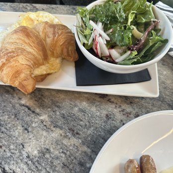 RIZE Ironworks - Croissant Sandwich with side salad - New American Near Me - Indianapolis, Indiana RIZE Ironworks - Croissant Sandwich with side salad - New American Near Me - Indianapolis, Indiana