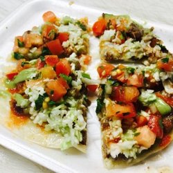 Carne asada taco pizza.