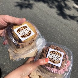 two cupcakes with frosting