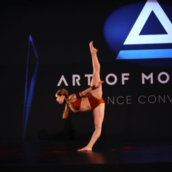 PAVE School of the Arts - Senior soloist, JuJu Roberts, onstage at Art of Movement Dance Convention.