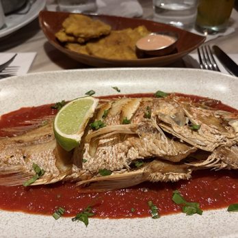 Casita Miramar - Back: tostones  Front: fried red snapper - Puerto Rican Near Me - San Juan, Puerto Rico