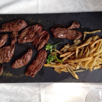 Roch - Buey a la brasa - Hotels Near Me - Altron, C