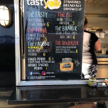 The Tasty Yolk - a menu on the side of a food truck - Food Trucks Near Me - Fairfield, Connecticut The Tasty Yolk - a menu on the side of a food truck - Food Trucks Near Me - Fairfield, Connecticut
