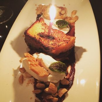 Fruition Restaurant - French toast with birthday candle. - New American Near Me - Denver, Colorado Fruition Restaurant - French toast with birthday candle. - New American Near Me - Denver, Colorado