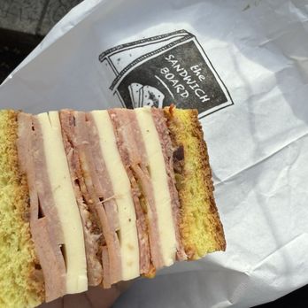 The Sandwich Board - Muffuletta ($14) - Sandwiches Near Me - New York, New York The Sandwich Board - Muffuletta ($14) - Sandwiches Near Me - New York, New York