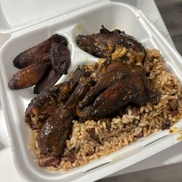 Jerk chicken  Rice and peas and fried plantains