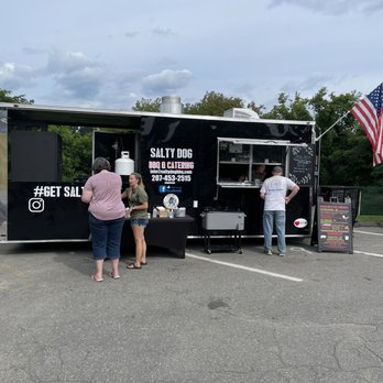 Salty Dog BBQ & Catering - people standing in a parking lot - Food Trucks Near Me Salty Dog BBQ & Catering - people standing in a parking lot - Food Trucks Near Me