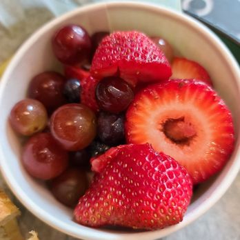 Chicken Salad Chick - a bowl of strawberries and grapes - Southern Near Me - Cincinnati, Ohio