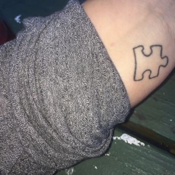 Evolved Body Art - Puzzle Piece done by Chris B - Piercing Near Me - Columbus, Ohio Evolved Body Art - Puzzle Piece done by Chris B - Piercing Near Me - Columbus, Ohio