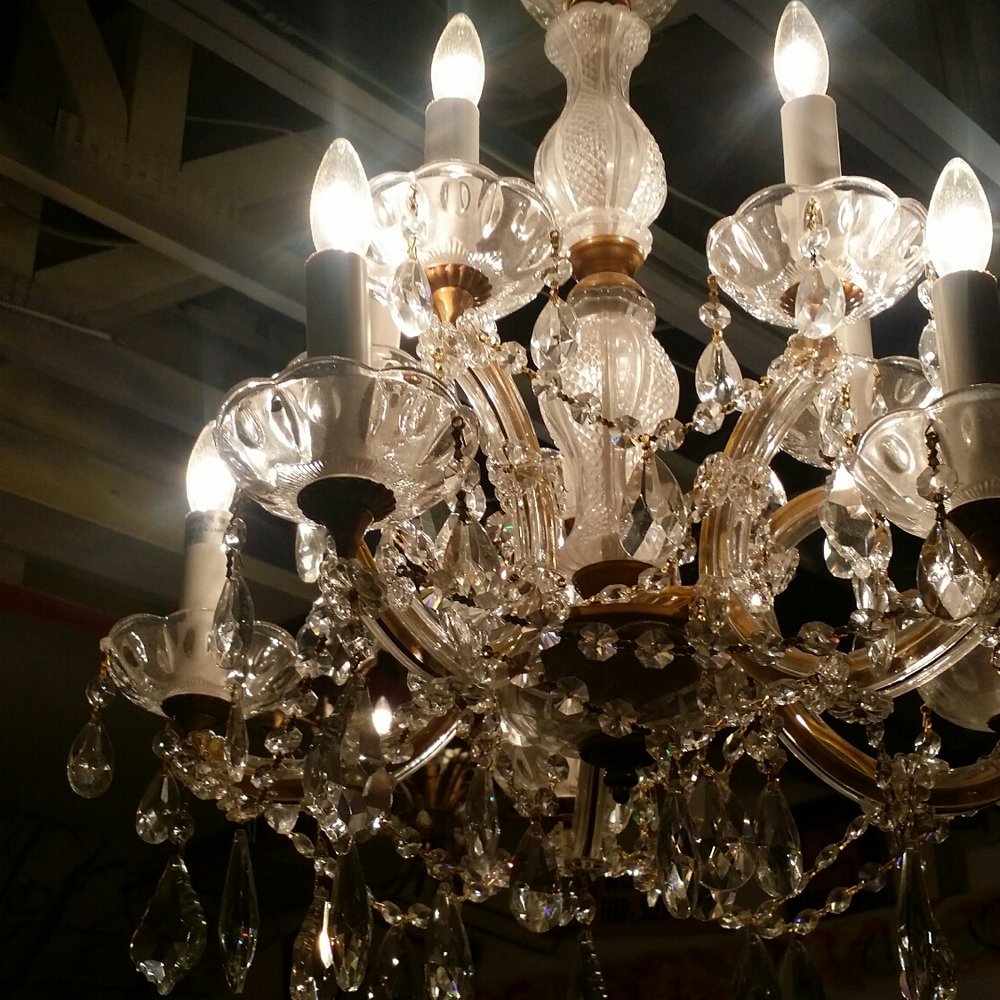Showcase Eatery - a chandelier with many lights - Seafood Near Me - College Park, Georgia