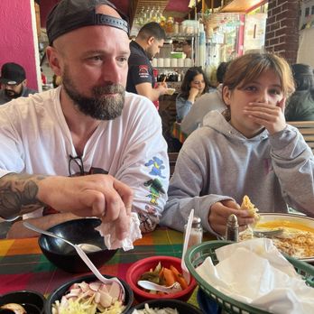 Carnitas La Flor de Michoacán 2 - She's enjoying her egg, rice and beans  with homemade flour tortillas - Mexican Near Me - Rosarito, BCN