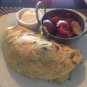 Six Seven Restaurant - Smoked bacon and avocado omelette - New American Near Me - Seattle, Washington Six Seven Restaurant - Smoked bacon and avocado omelette - New American Near Me - Seattle, Washington