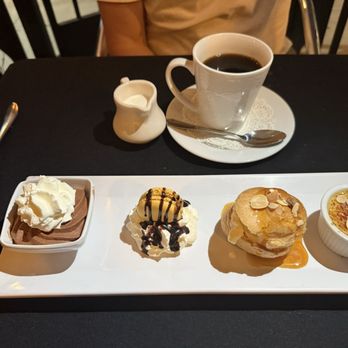 Le Chat Noir - Dessert with coffee - French Near Me - Riverside, California Le Chat Noir - Dessert with coffee - French Near Me - Riverside, California