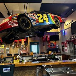 Quaker Steak & Lube - Race cars hanging from ceilings. Cool experience!