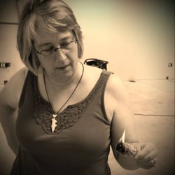 The Happy Hippy Boutique - This is Angela, one of the owners. She is smudging the new store (10 Manchester Road).