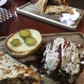 NOLA Taphouse - Brisket Quesadilla and brisket sandwich - New American Near Me - New Orleans, Louisiana NOLA Taphouse - Brisket Quesadilla and brisket sandwich - New American Near Me - New Orleans, Louisiana