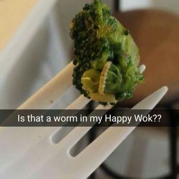 a piece of broccoli on a fork a piece of broccoli on a fork