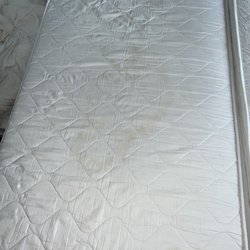 MEININGER Hotel Wien Downtown Franz - Had to pull our own sheets & bag our own trash. Mattress was stained.