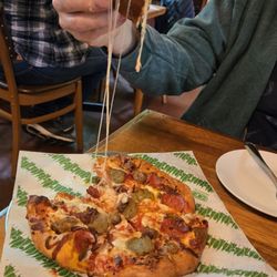 Upriver Grill & Taproom - Carnivore pizza... so cheesy.
