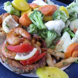 Buttery steamed vegetables and potato skin stuffed with seafood! Buttery steamed vegetables and potato skin stuffed with seafood!