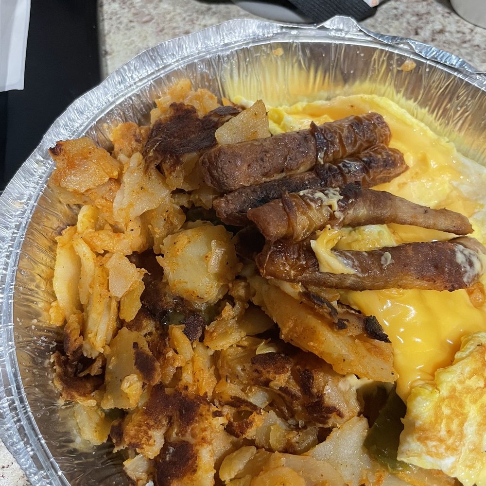 Tropical Coffee Shop - an omelet with meat and potatoes - Coffee & Tea Near Me - Brooklyn, New York Tropical Coffee Shop - an omelet with meat and potatoes - Coffee & Tea Near Me - Brooklyn, New York