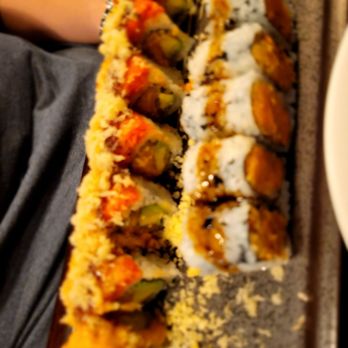 Yellowtail Japanese Bistro - a sushi roll on a tray - Japanese Near Me - Rutherford, New Jersey Yellowtail Japanese Bistro - a sushi roll on a tray - Japanese Near Me - Rutherford, New Jersey