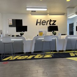 Hertz Rent A Car - Nobody else there except for the manager who was in the back, washing and cleaning the car he was going to rent to us.