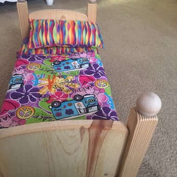 A Doll's World - Sturdy wooden Doll bed with cool linens - Children's Clothing Near Me - Augusta, Georgia