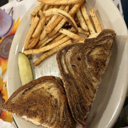 Reuben (with Lid) and French Fries. Reuben (with Lid) and French Fries.