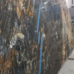 Blue tape shows where this slab is cracked from bottom to nearly the top