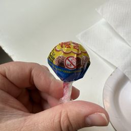 Complimentary meatball lollipop at the food court . Tastes like a candy meatball, would not recommend. Complimentary meatball lollipop at the food court . Tastes like a candy meatball, would not recommend.