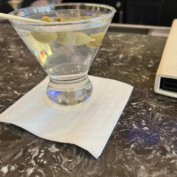 L BAR - a martini on a napkin with a slice of lemon - Gastropubs Near Me - Hartford, Connecticut