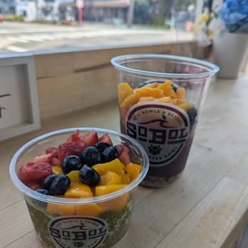 SoBoL - Classic green bowl (front), class acai bowl with extra mangos (back) - Acai Bowls Near Me - New Hyde Park, New York SoBoL - Classic green bowl (front), class acai bowl with extra mangos (back) - Acai Bowls Near Me - New Hyde Park, New York
